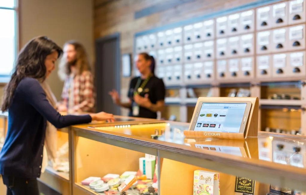 Boutique retail POS at a curated product display counter